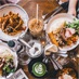 plentiful plates of pasta on a table